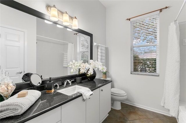 full bathroom featuring vanity, shower / bath combination with curtain, and toilet