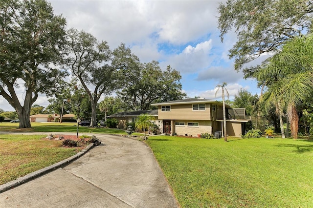 view of front of home with a front lawn