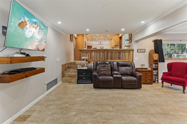 living area with ornamental molding