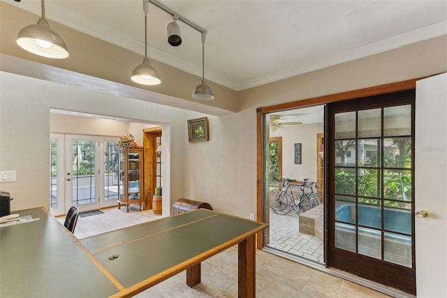 game room with french doors, rail lighting, ceiling fan, and ornamental molding