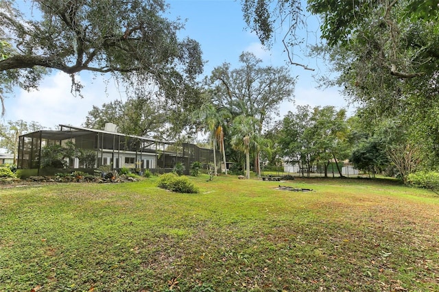 view of yard featuring a lanai