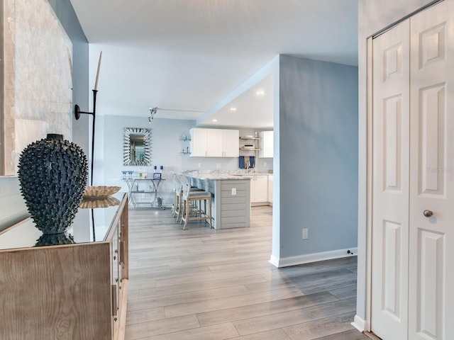 interior space with light hardwood / wood-style floors