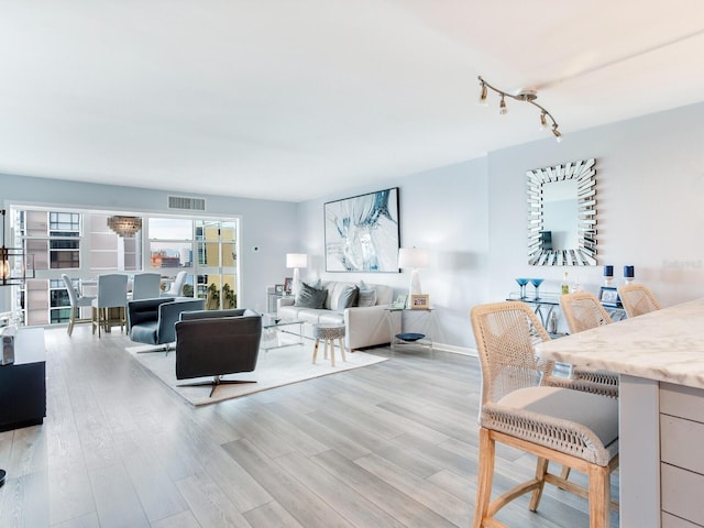 living room featuring light hardwood / wood-style flooring