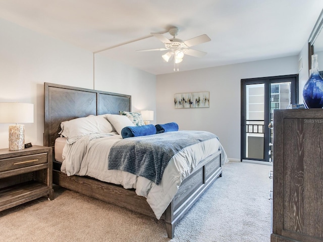 bedroom featuring access to exterior, ceiling fan, and light colored carpet