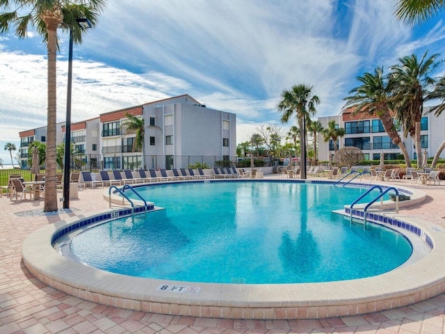 view of pool featuring a patio area