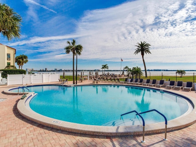 view of swimming pool with a patio