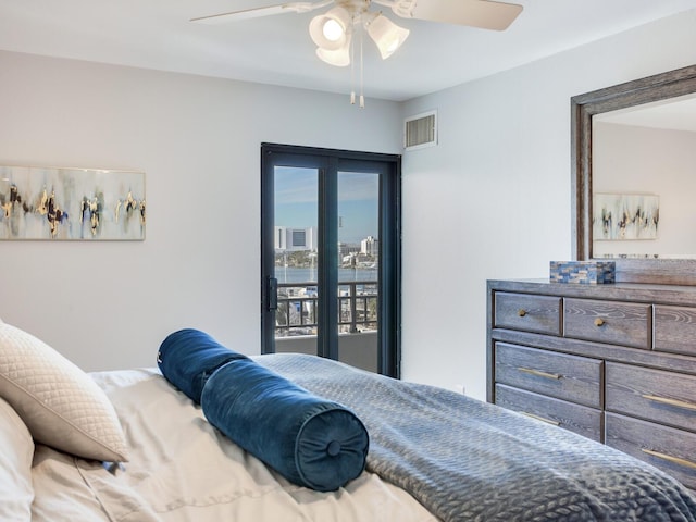 bedroom with ceiling fan, access to exterior, and french doors