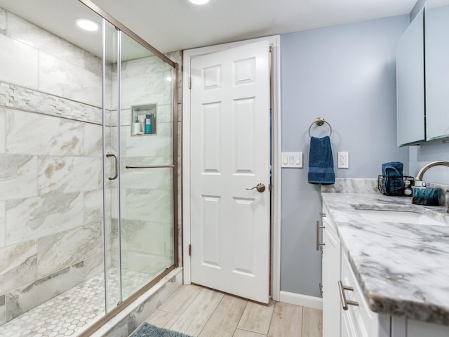 bathroom featuring vanity and walk in shower