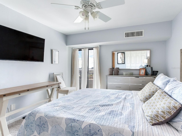 bedroom with light carpet and ceiling fan