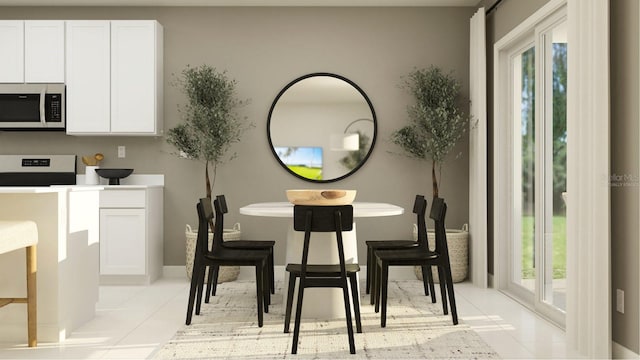 dining room with light tile patterned floors