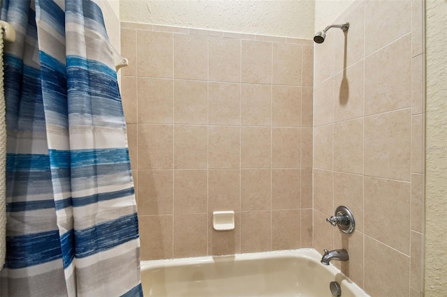 bathroom featuring shower / bath combination with curtain