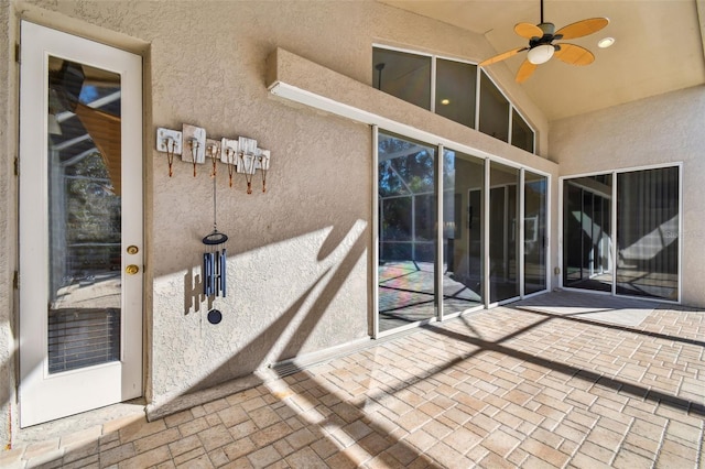 view of patio with ceiling fan