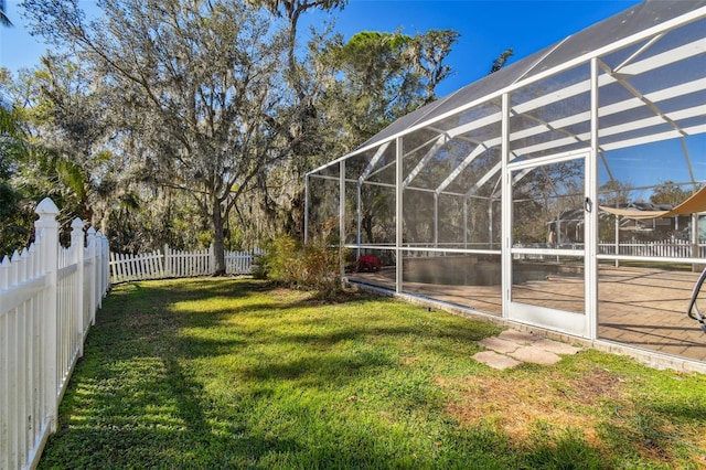 view of yard featuring a lanai