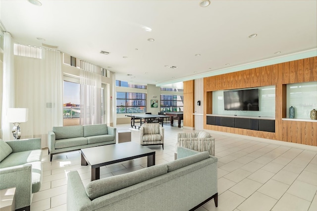 living room featuring wooden walls