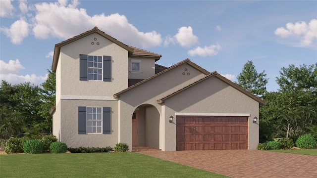 view of front facade with a garage and a front yard