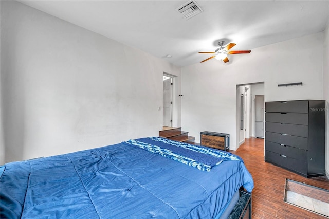 bedroom featuring ceiling fan and wood-type flooring