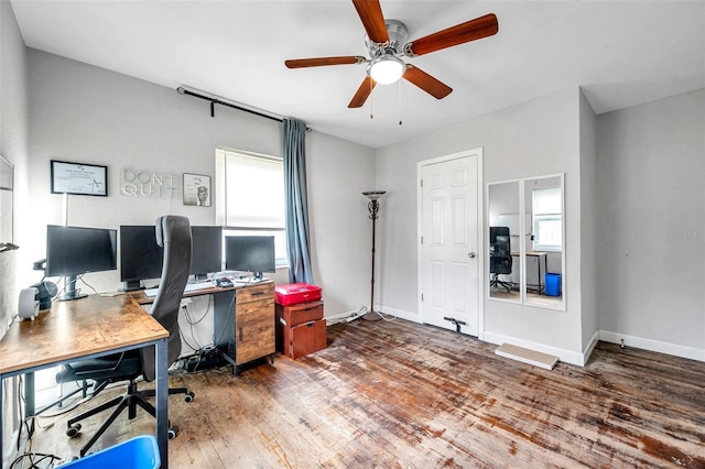 office with ceiling fan, dark wood-type flooring, and plenty of natural light