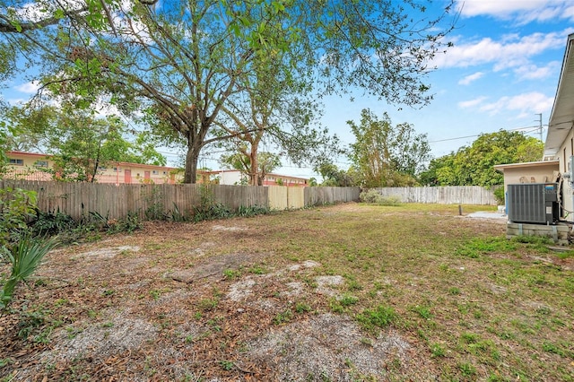 view of yard featuring central AC