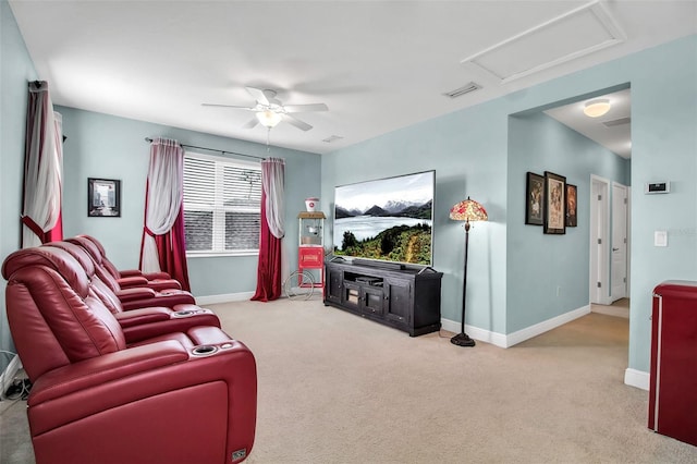 living room featuring ceiling fan and carpet flooring