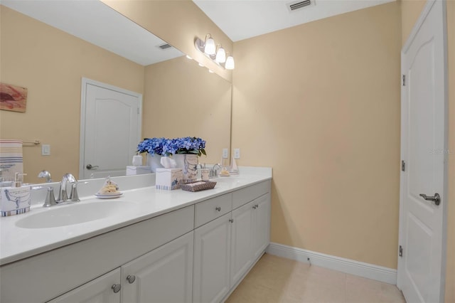 bathroom with vanity and tile patterned floors