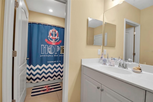 bathroom featuring vanity, tile patterned floors, and a shower with shower curtain