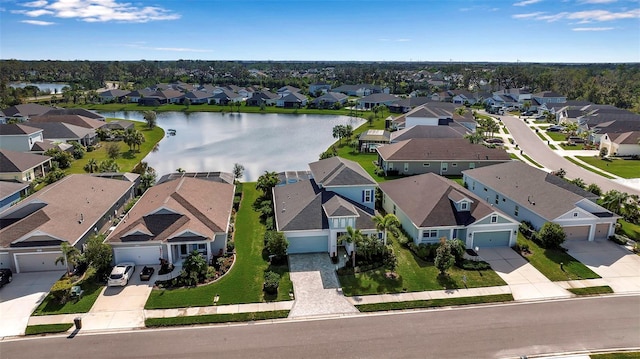 bird's eye view with a water view