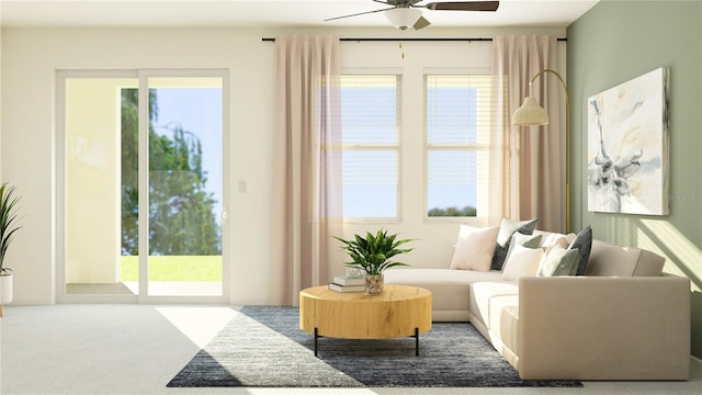 carpeted living room with plenty of natural light and ceiling fan