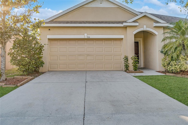 ranch-style home with a garage