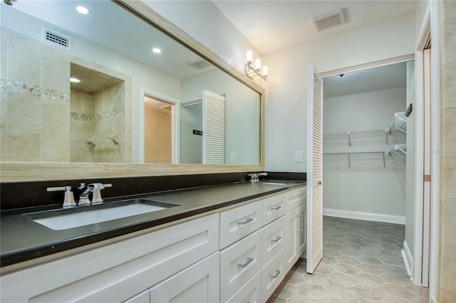 bathroom featuring vanity and tile patterned floors