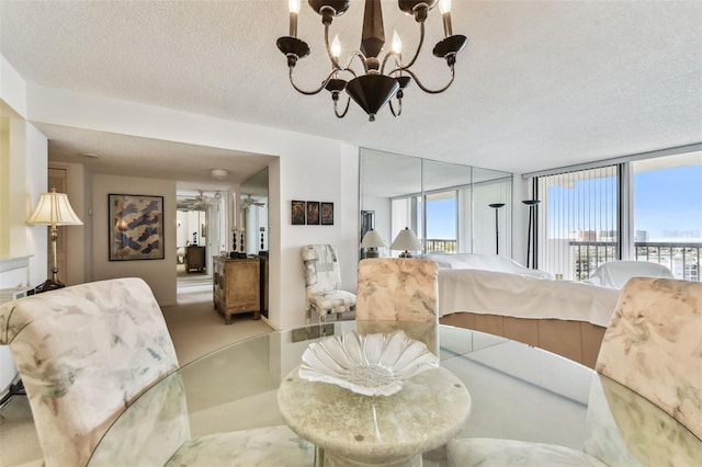 dining area featuring floor to ceiling windows, a textured ceiling, light carpet, and a chandelier