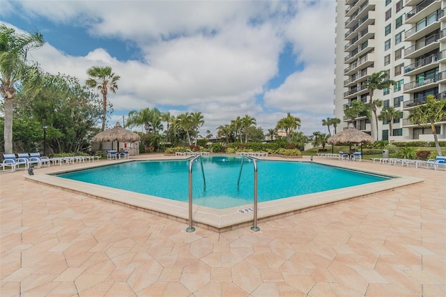 view of swimming pool featuring a gazebo and a patio area