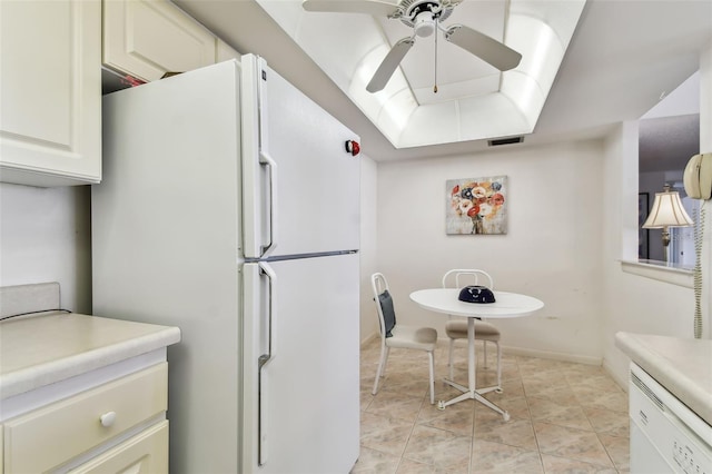 kitchen featuring ceiling fan, light tile patterned flooring, and white appliances