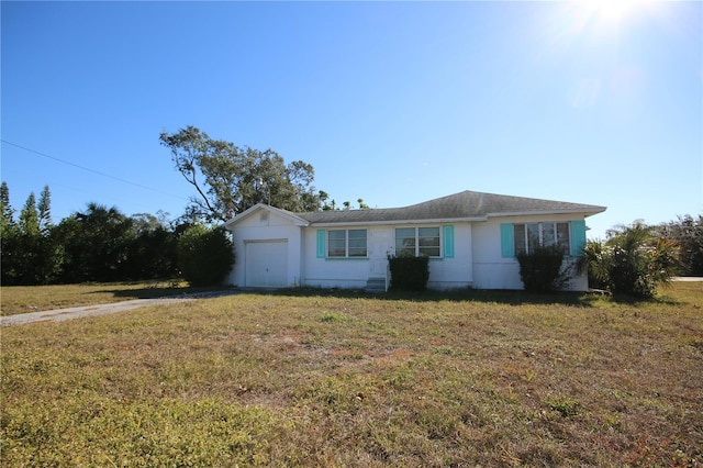 ranch-style home with a front yard