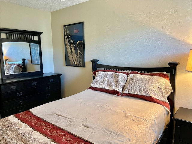 bedroom with a textured ceiling