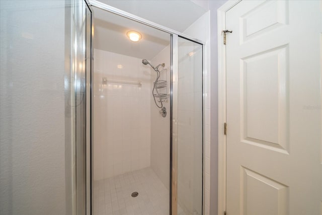 bathroom with an enclosed shower