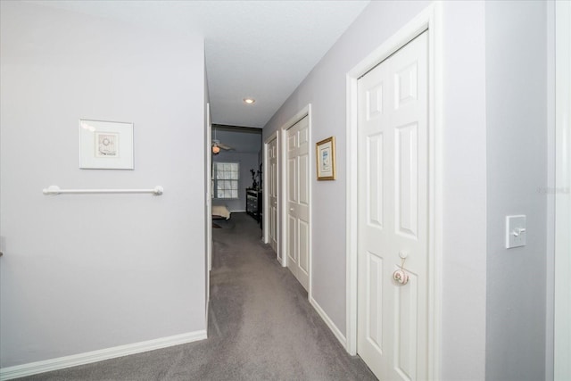 corridor featuring carpet flooring