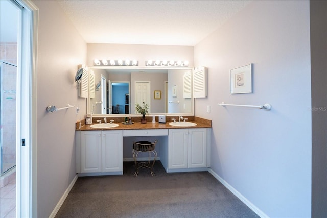 bathroom featuring vanity and walk in shower