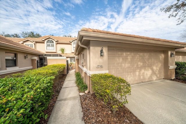 view of side of property featuring a garage