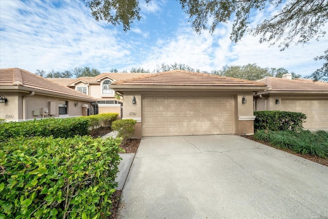 single story home with a garage