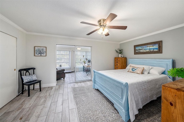 bedroom featuring access to outside, light hardwood / wood-style flooring, ceiling fan, and crown molding