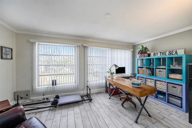 office area with a textured ceiling, light hardwood / wood-style floors, and ornamental molding