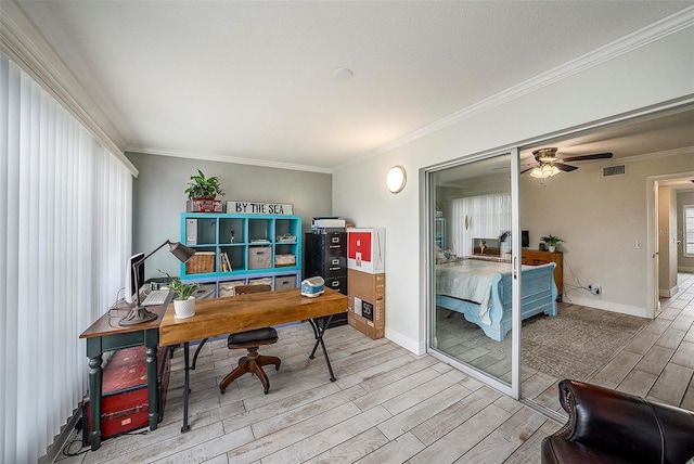 office featuring plenty of natural light and ornamental molding