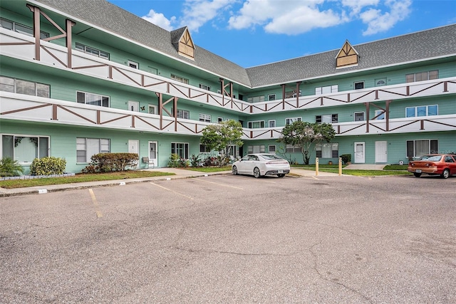 2043 Denmark St Unit 65, Clearwater, FL 33763 - view of property featuring uncovered parking