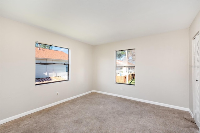 view of carpeted spare room