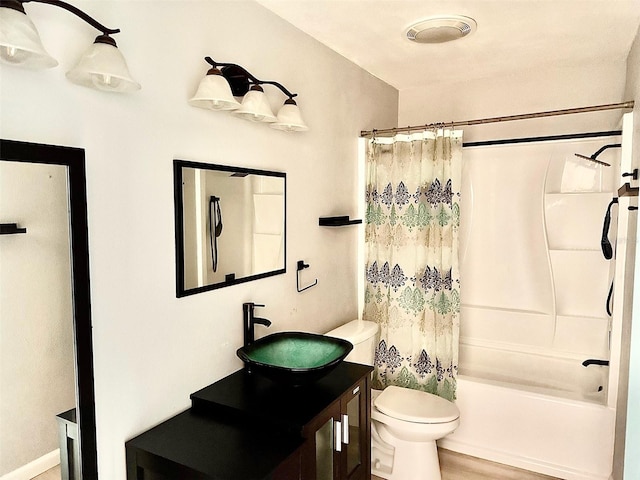 full bathroom with vanity, shower / bathtub combination with curtain, wood-type flooring, and toilet