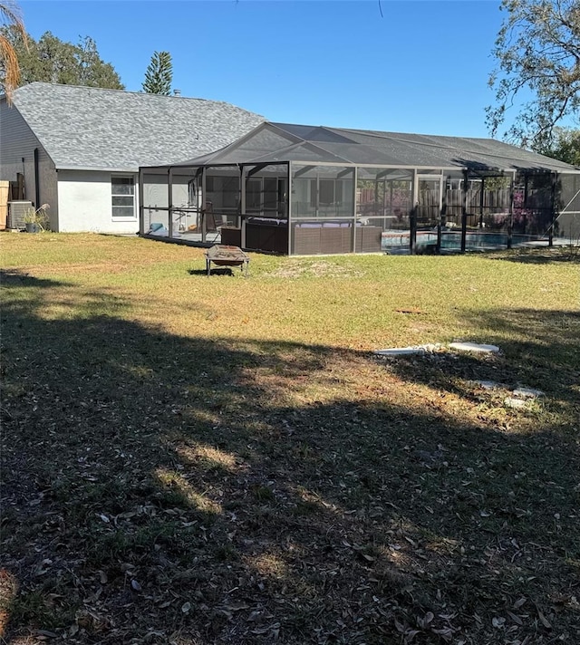 view of home's community with a yard and a swimming pool