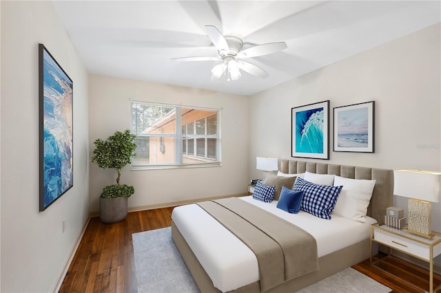 bedroom with hardwood / wood-style flooring and ceiling fan