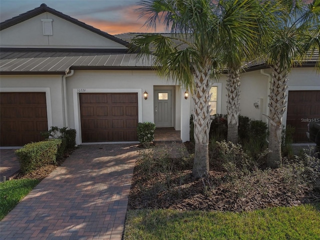 view of front of house with a garage