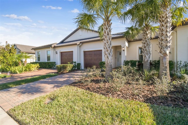 view of front of home with a garage