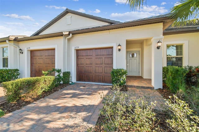 view of front of property with a garage